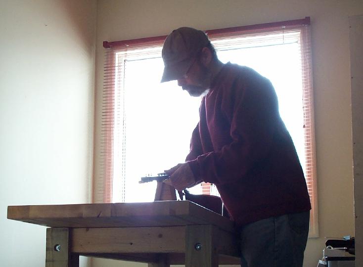 photo of scott at workbench